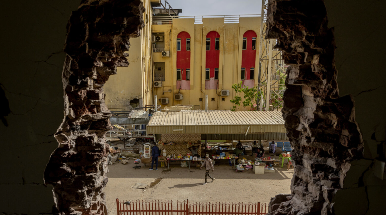 Can digital cash transfers serve those in active conflict zones? Evidence from Sudan